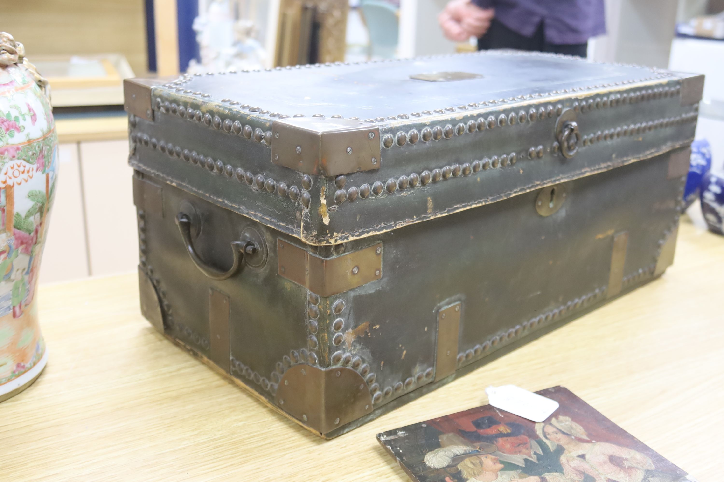 A 19th century Indo colonial leather and brass mounted travelling trunk, length 54cm, camphor wood lined